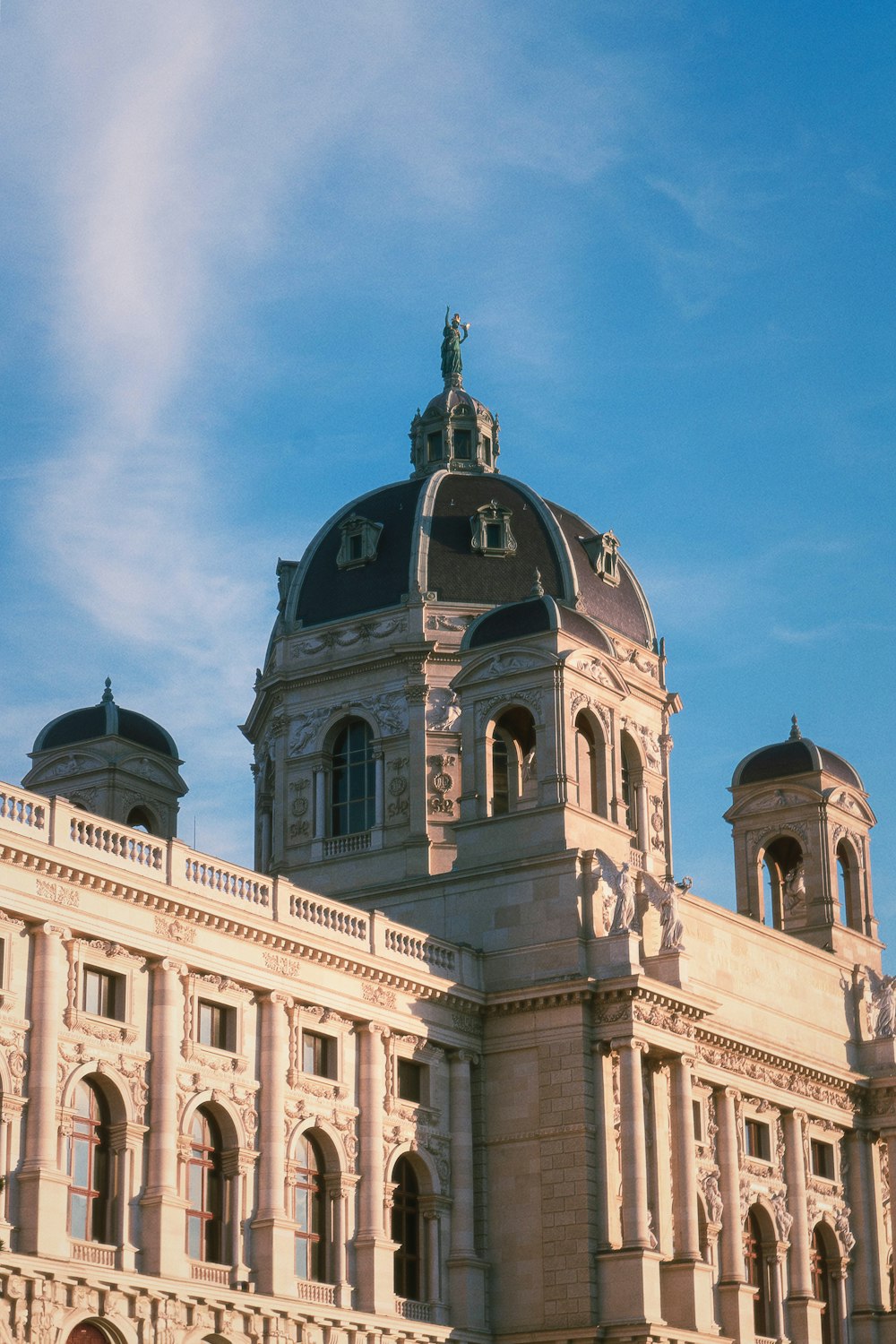 a large building with a clock on the top of it