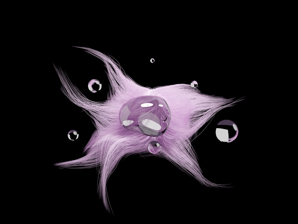 a purple object with bubbles and bubbles on a black background