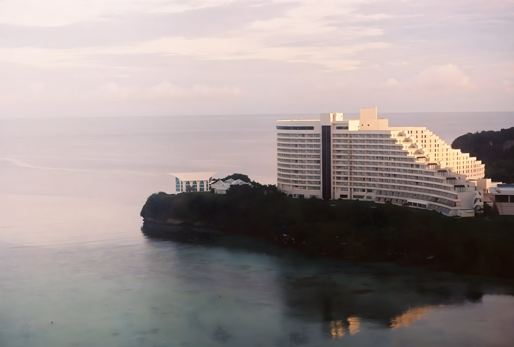 a hotel on a small island in the middle of the ocean