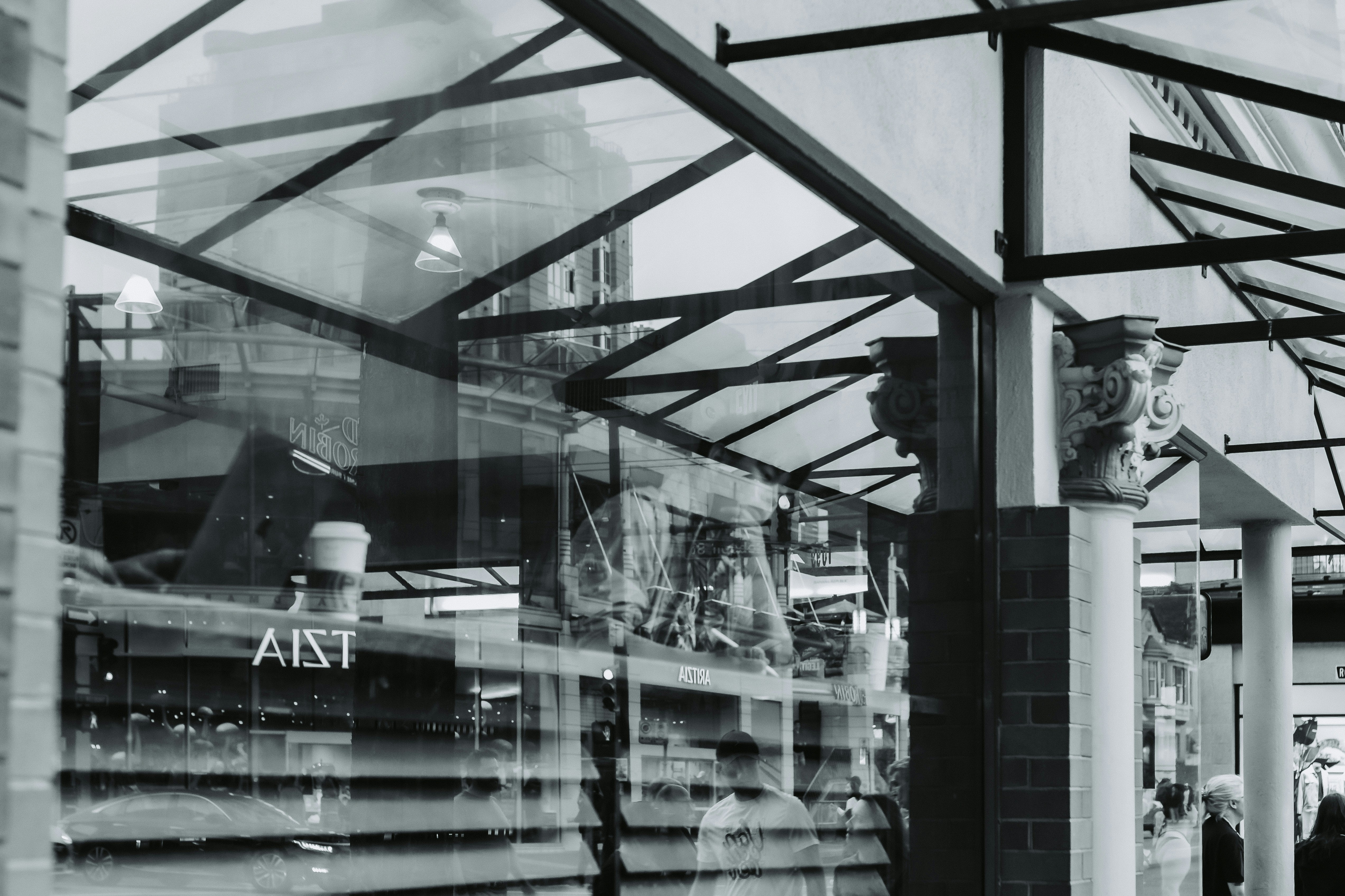 a black and white photo of a store front