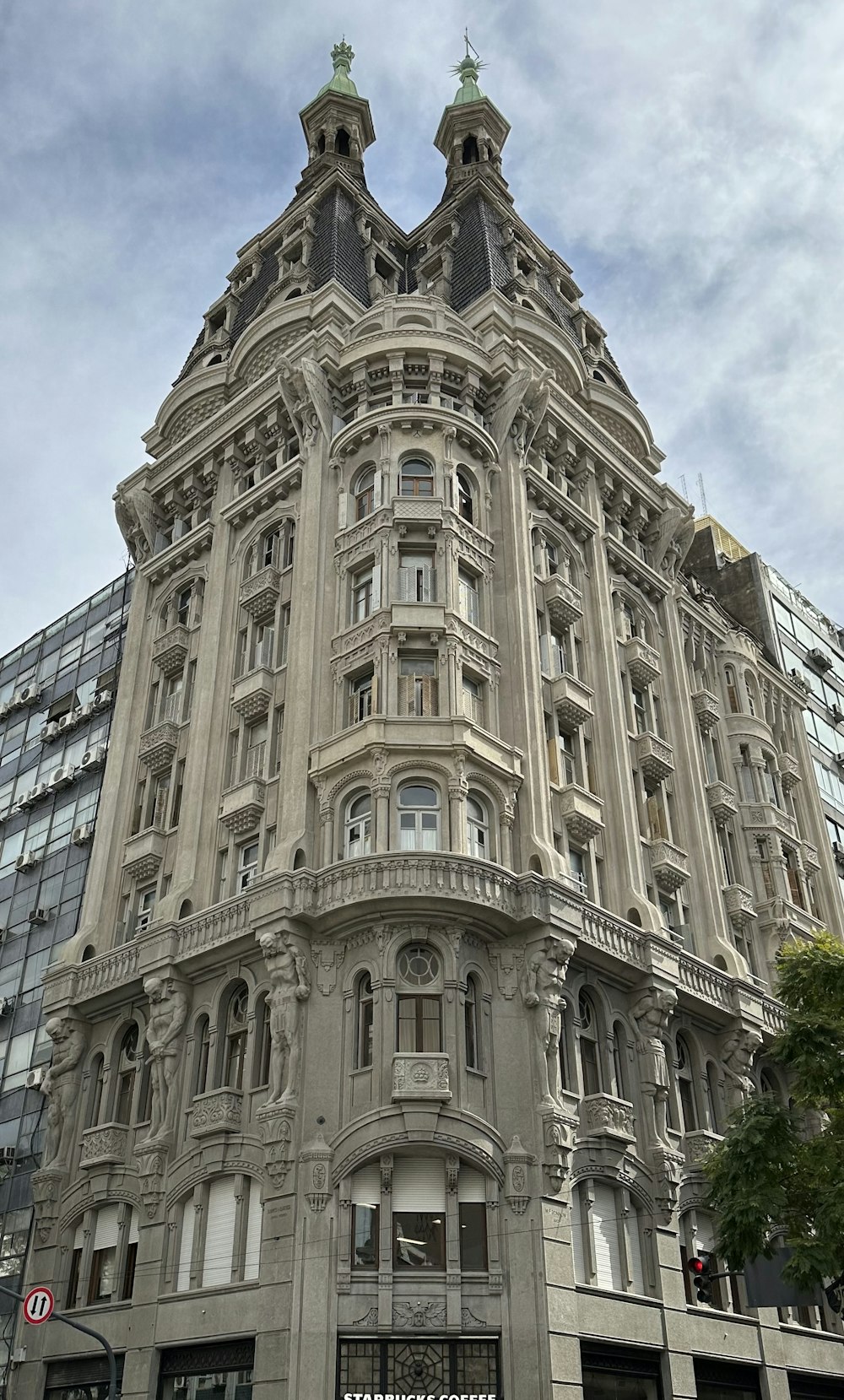 a large building with a clock on the top of it