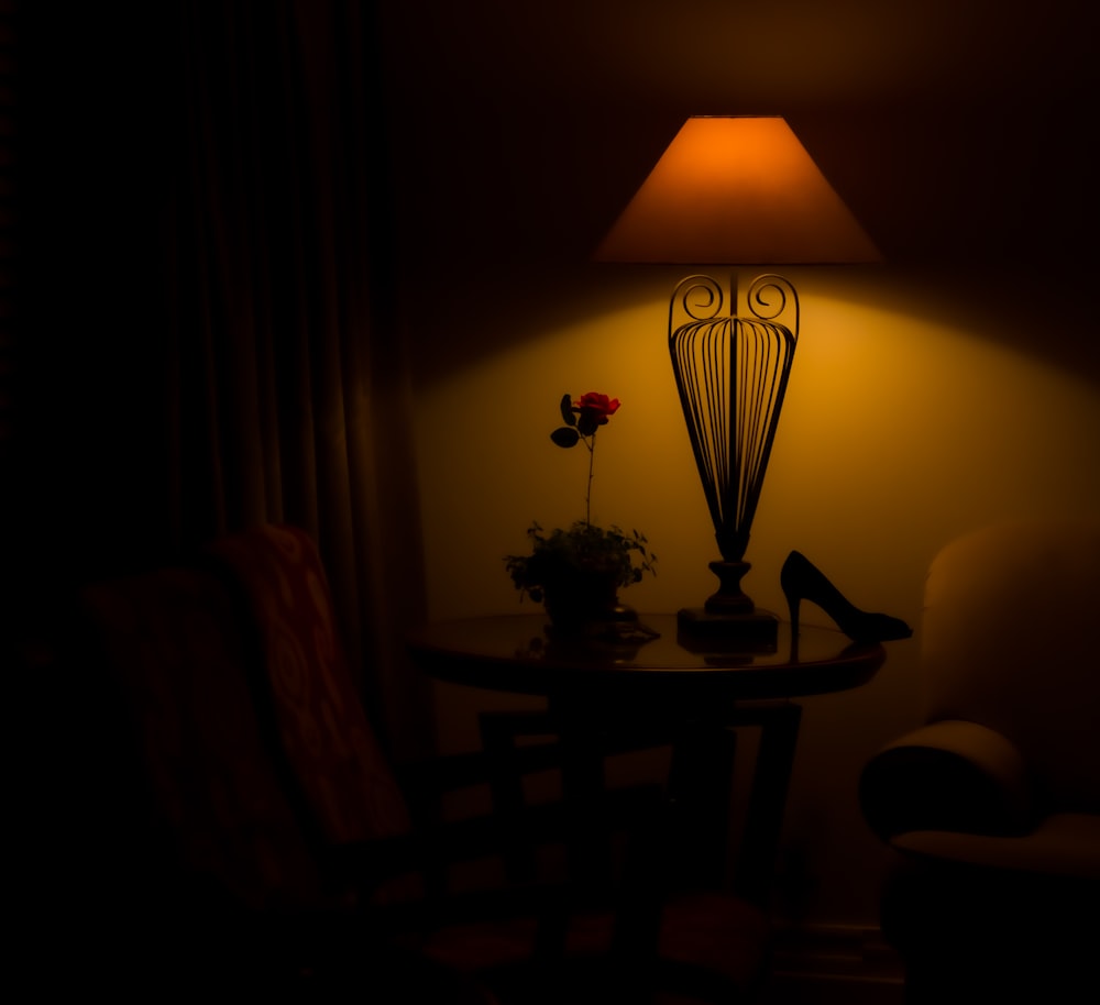 a chair and a table in a dark room