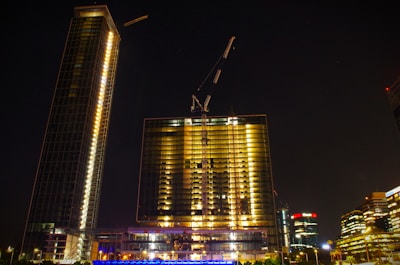 a very tall building with a crane on top of it