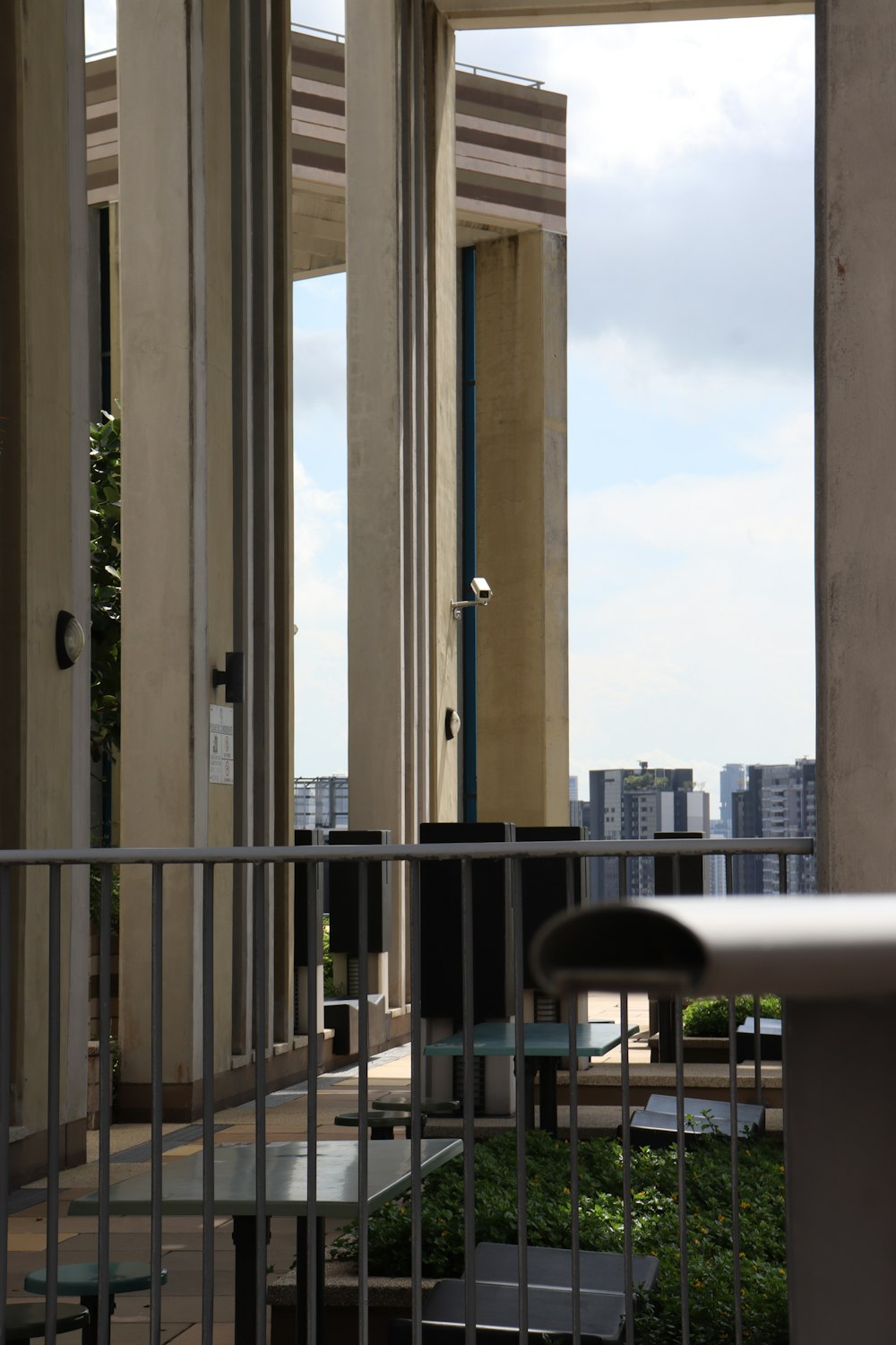 a view of a building through a gate