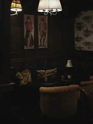 Stylish furniture arranged in a dark, inviting atmosphere.