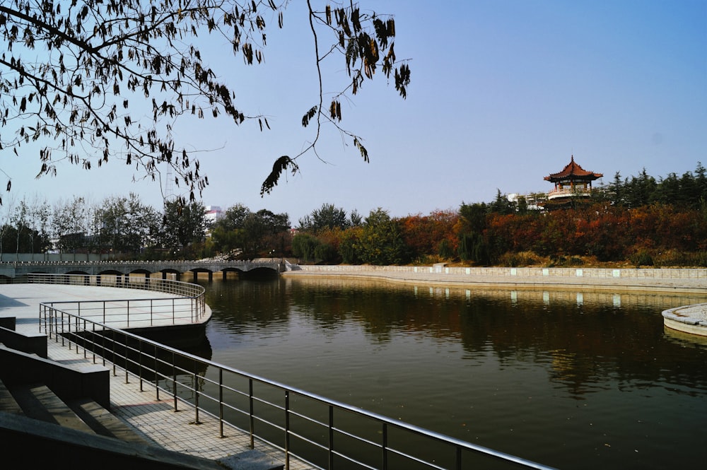 a large body of water next to a bridge