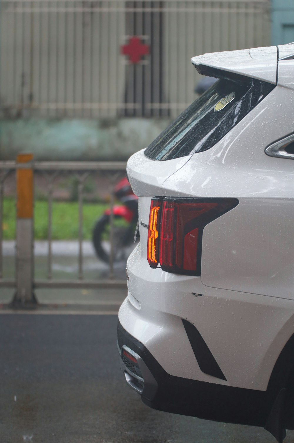 a white car parked on the side of the road