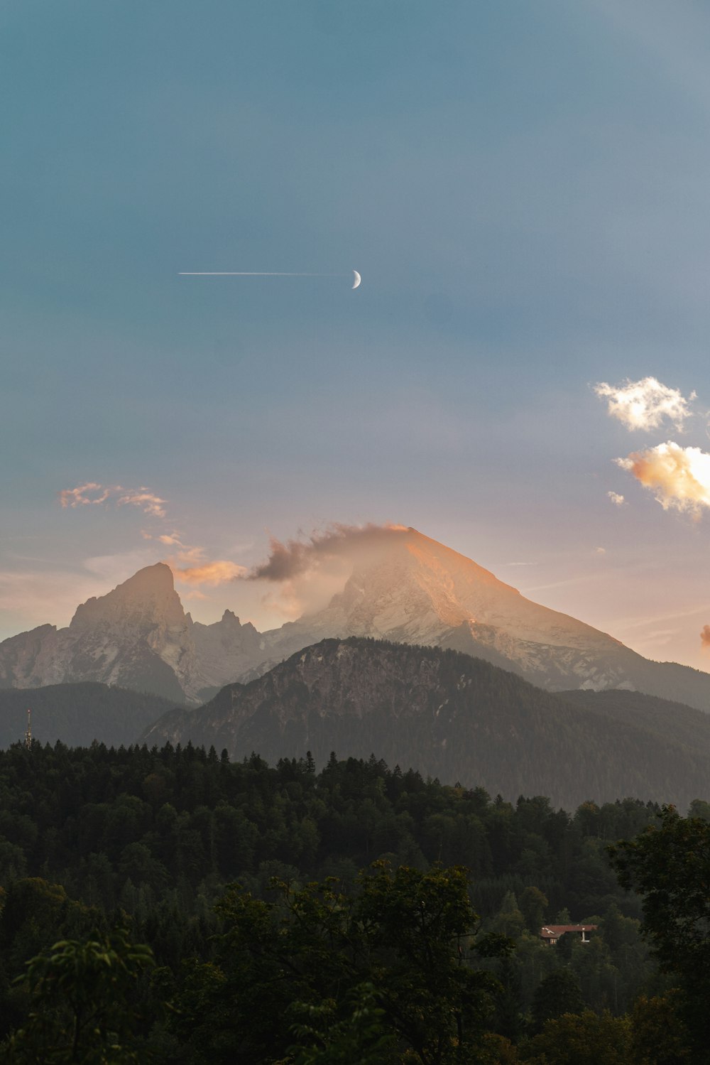 a view of a mountain range at sunset