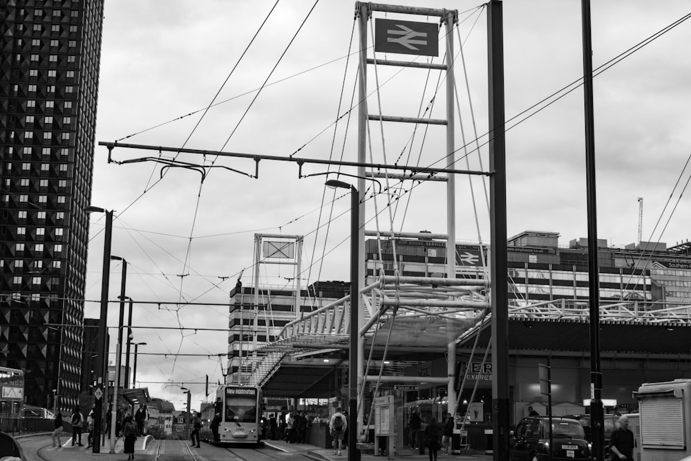 a black and white photo of a train station