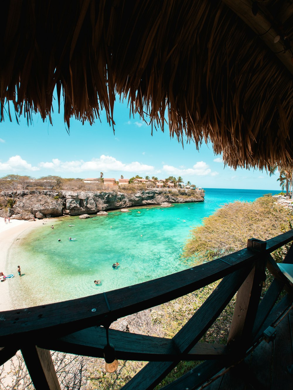 a view of a beach from a deck