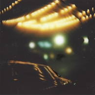 A mystical night scene with softly glowing lights symbolizing spiritual guidance.