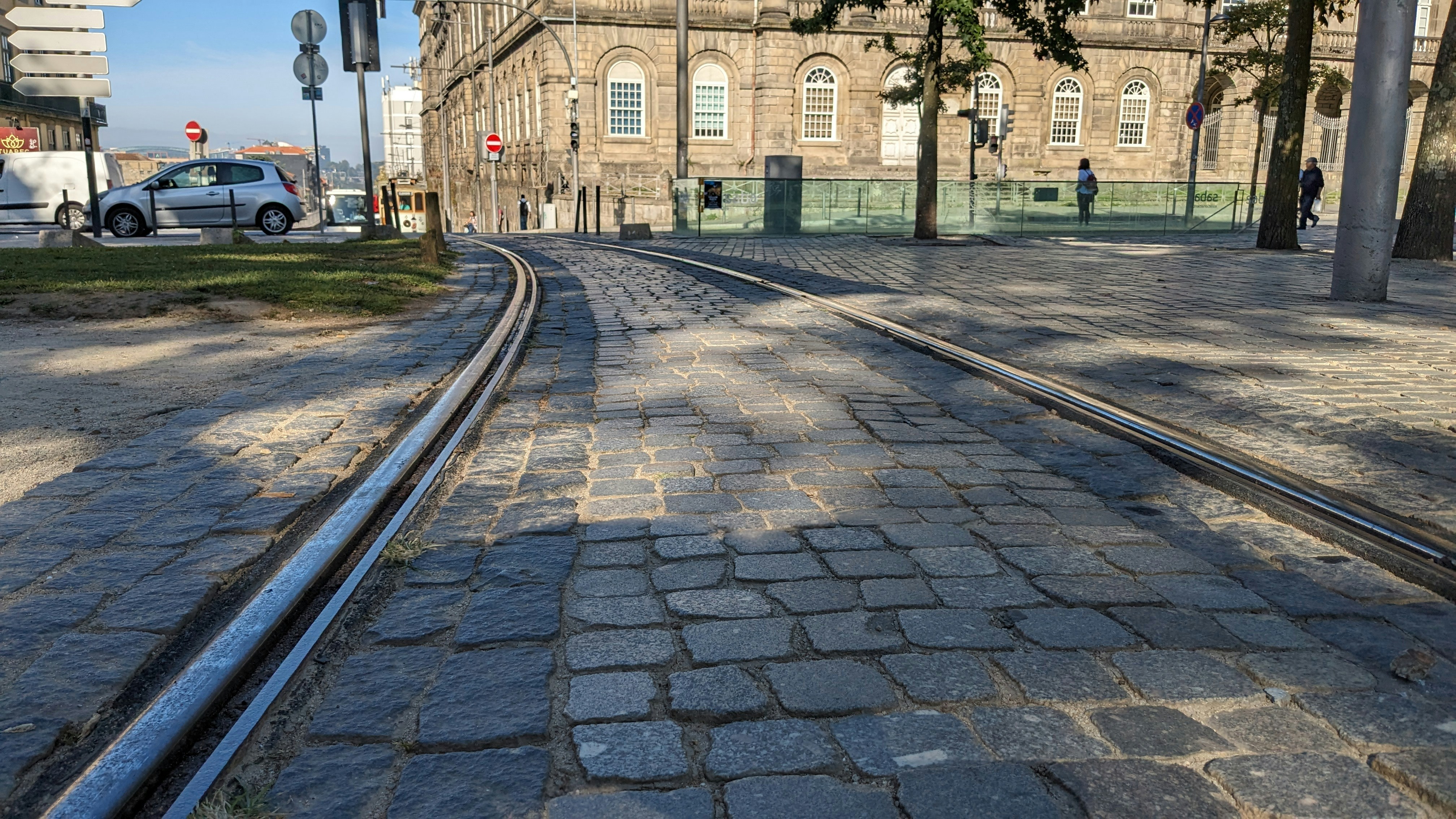 a street with a train track going through it