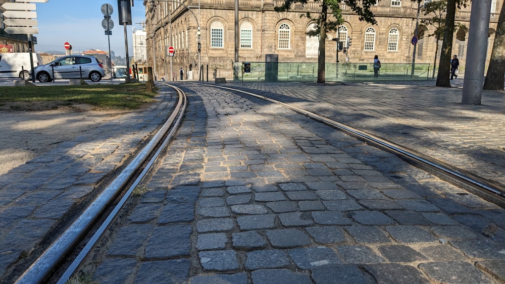 a street with a train track going through it