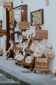 a display of baked goods in front of a store