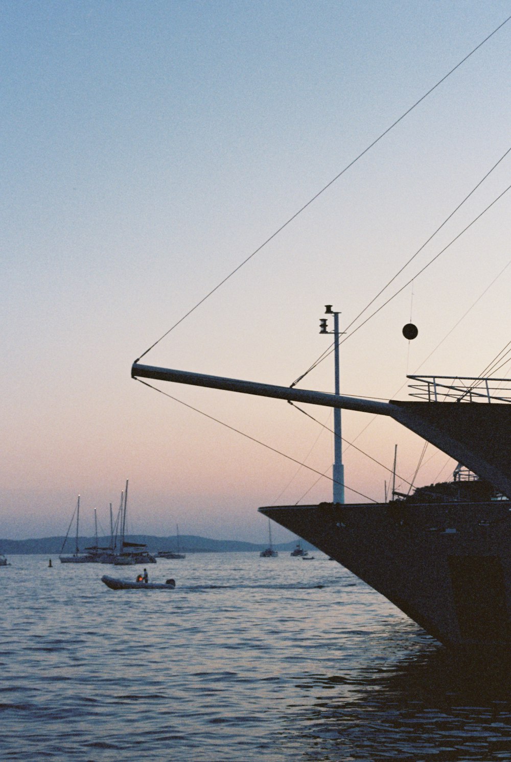 a large boat floating on top of a body of water