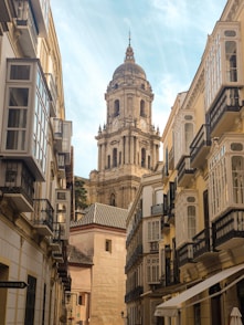 a large building with a clock on the top of it