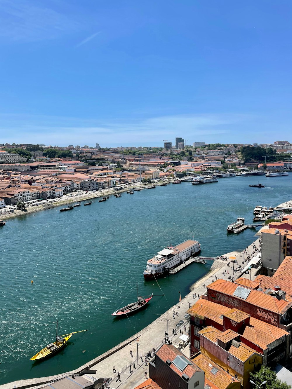 a body of water with a bunch of boats in it