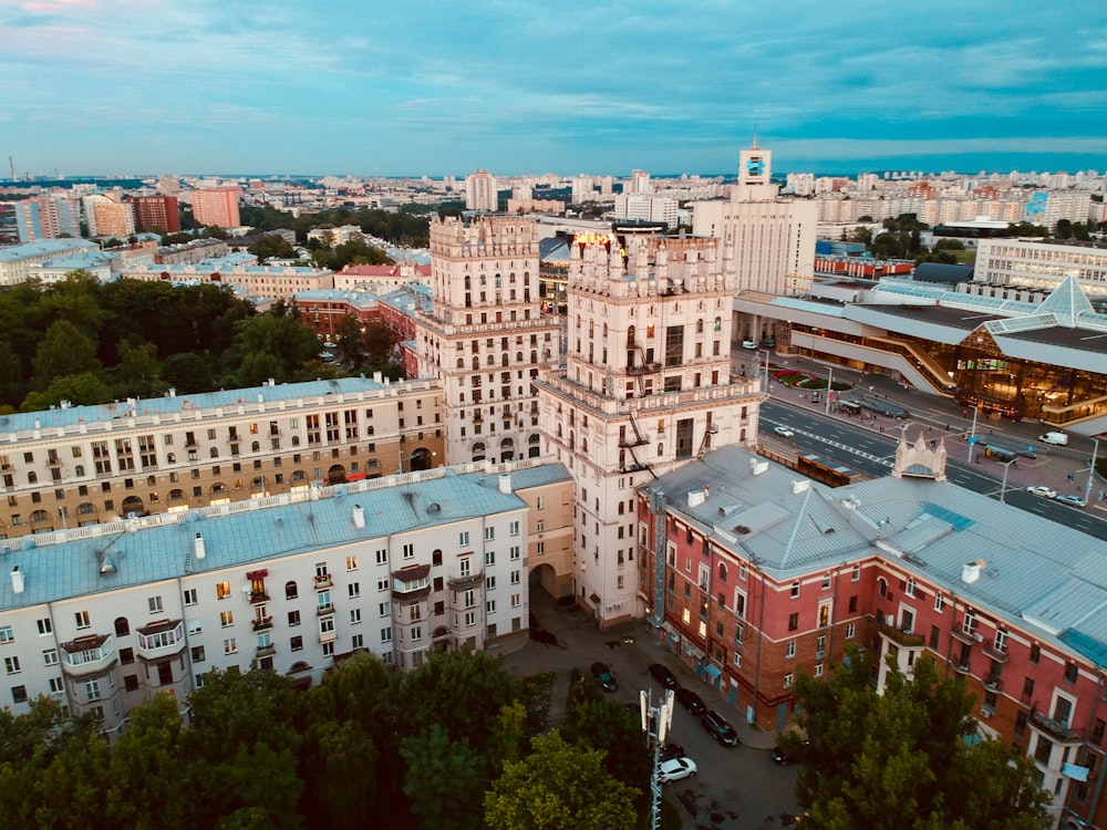 an aerial view of a city with many buildings