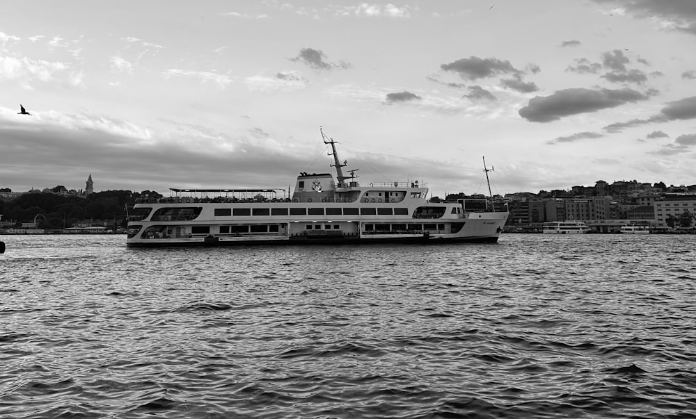 a large boat floating on top of a large body of water