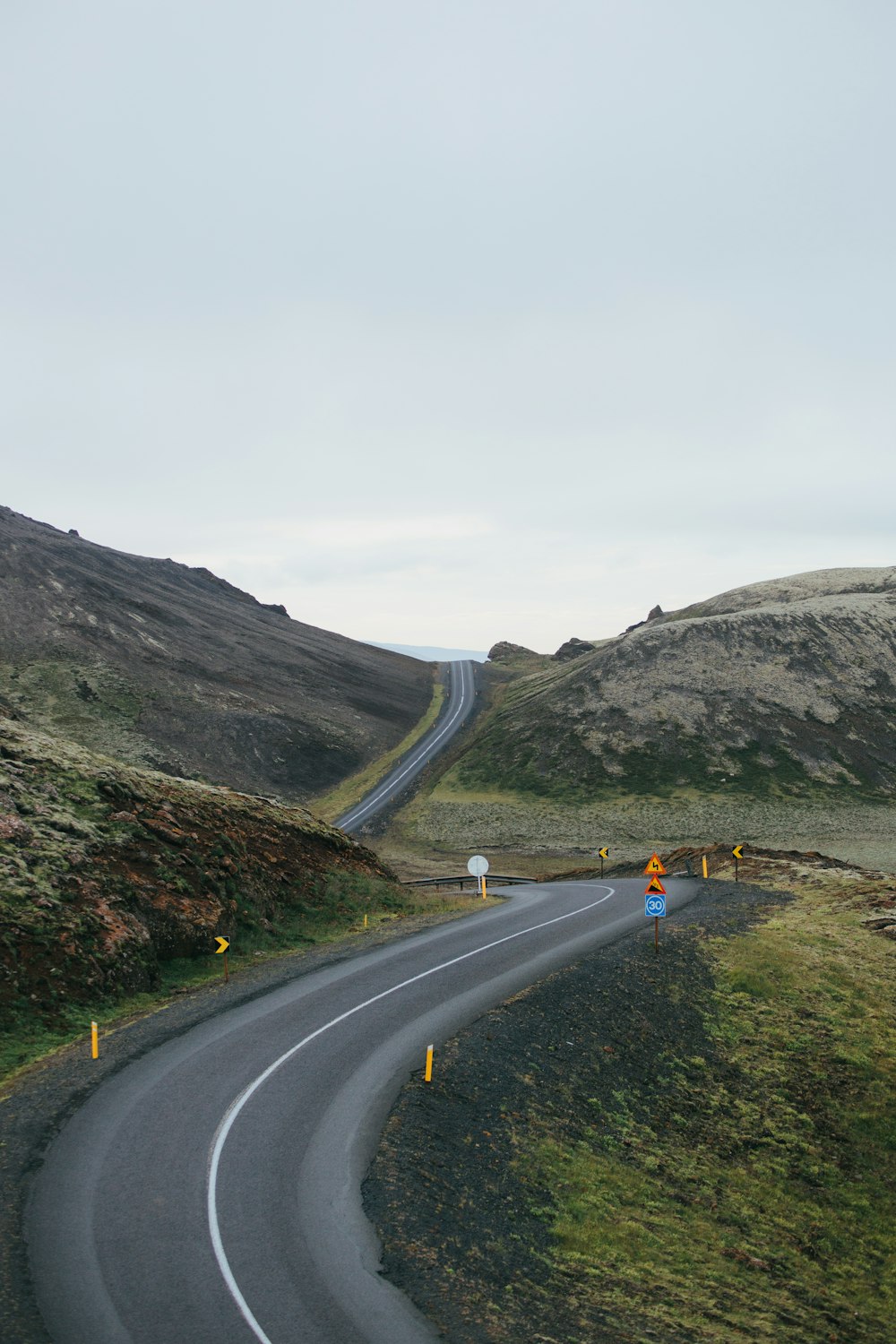 a curve in the road in the middle of nowhere