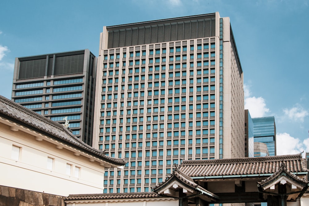 a tall building with a lot of windows in front of it