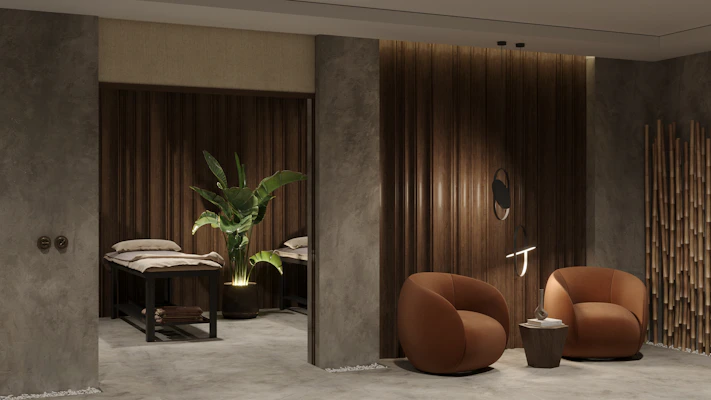 a couple of chairs sitting next to each other in a room