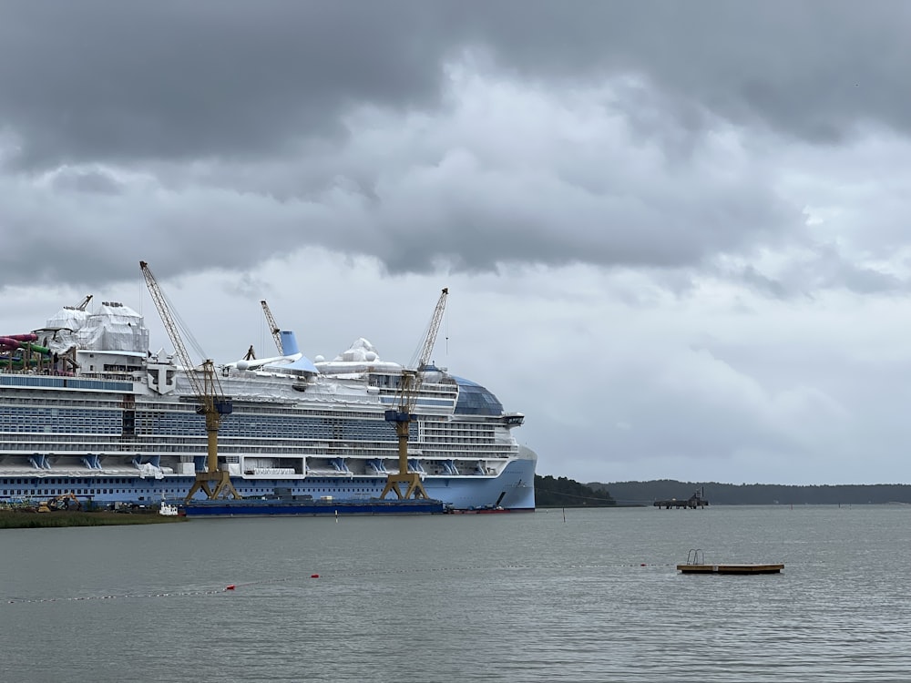 a large cruise ship in a body of water