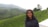 A happy traveler enjoying the beautiful landscapes of Kashmir.