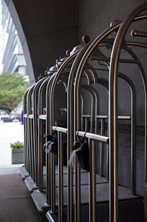 Housekeeping carts neatly arranged in a bright hotel corridor, showcasing Gastroprime's cleaning solutions.