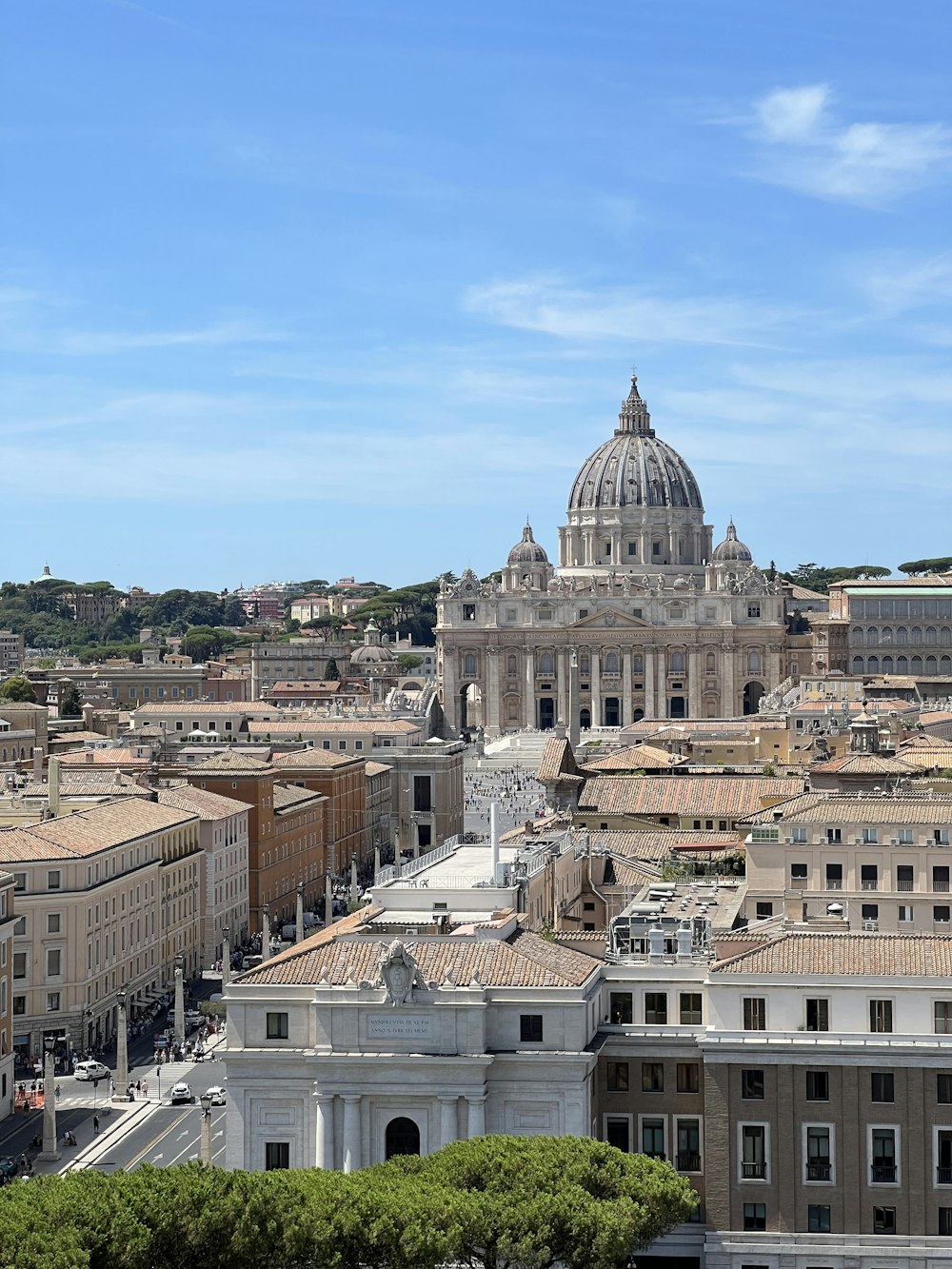 a view of a city with a dome in the background