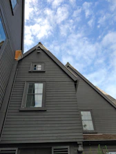 a tall building with a clock on the side of it