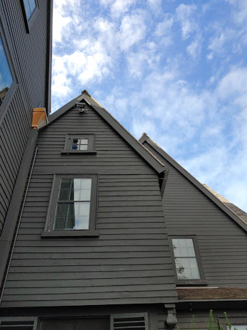 a tall building with a clock on the side of it