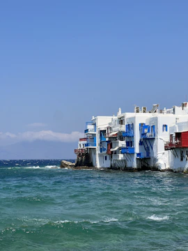 Blue and white themed luxury rental units with sunset view