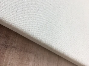 Detailed shot of a 1:1 square canvas corner highlighting the sturdy 3cm wooden stretcher bar