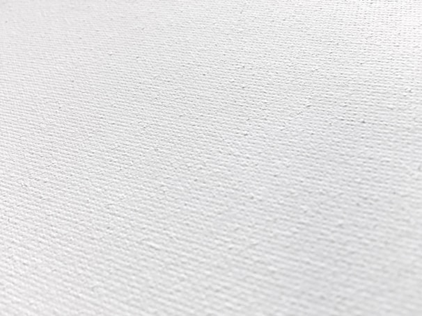 Close-up of a crisp white canvas with subtle geometric lines rendered by AI.