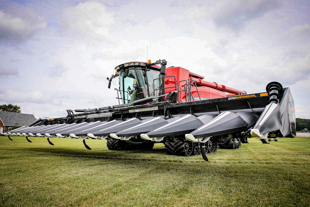 a large tractor is parked in a field