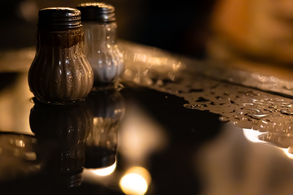 a couple of bottles sitting on top of a table