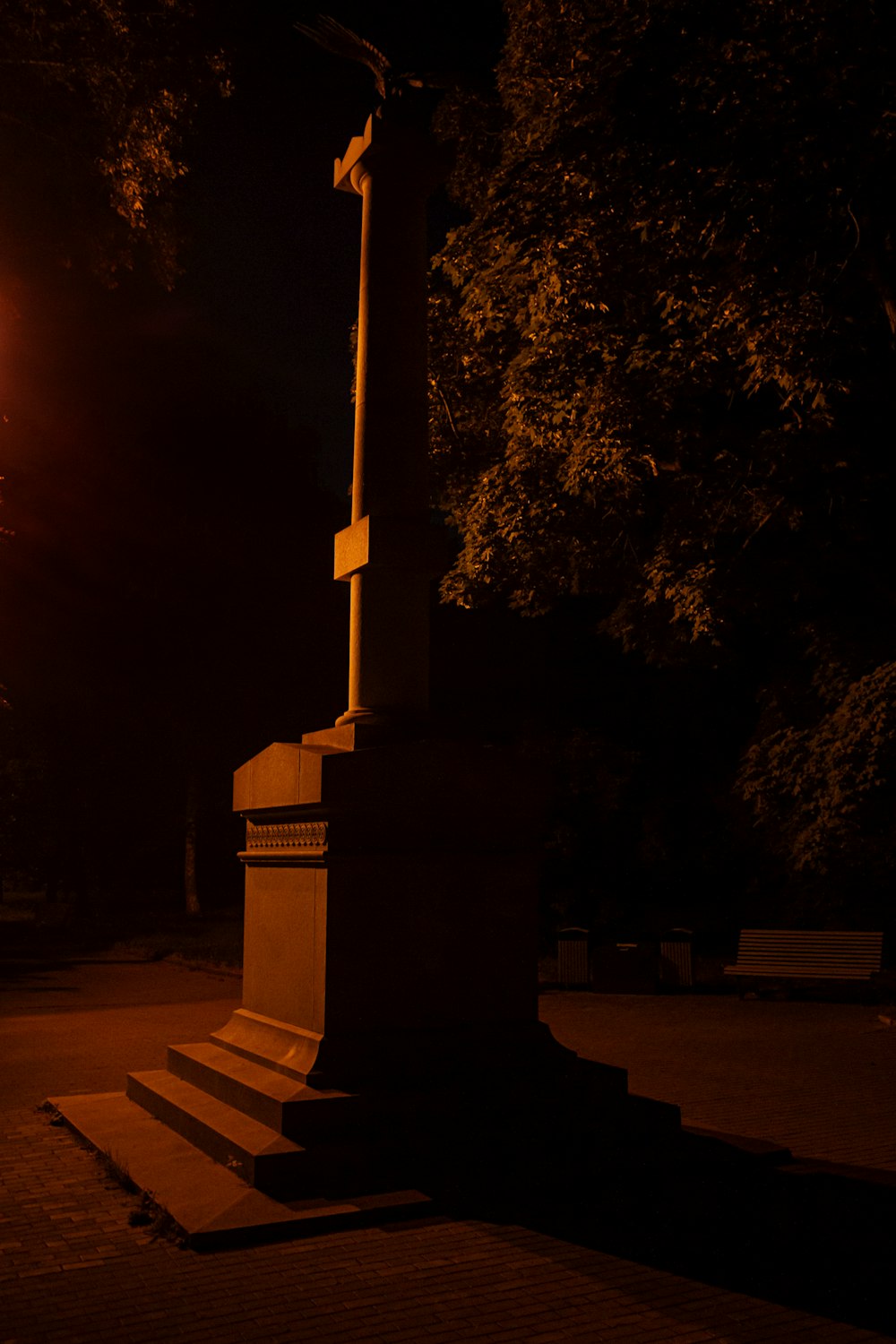 a street light sitting on the side of a road