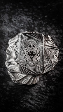 a silver ring with a lion on it