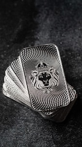 a silver ring with a lion on it