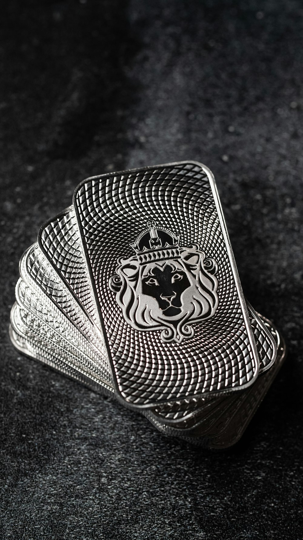 a silver ring with a lion on it