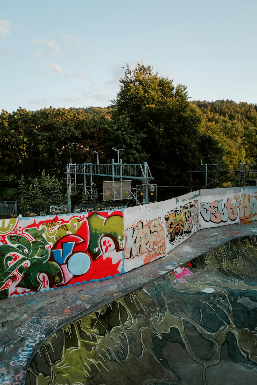 a man riding a skateboard on top of a ramp