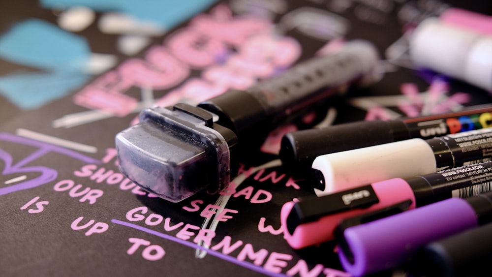 a close up of a bunch of lipstick on a table