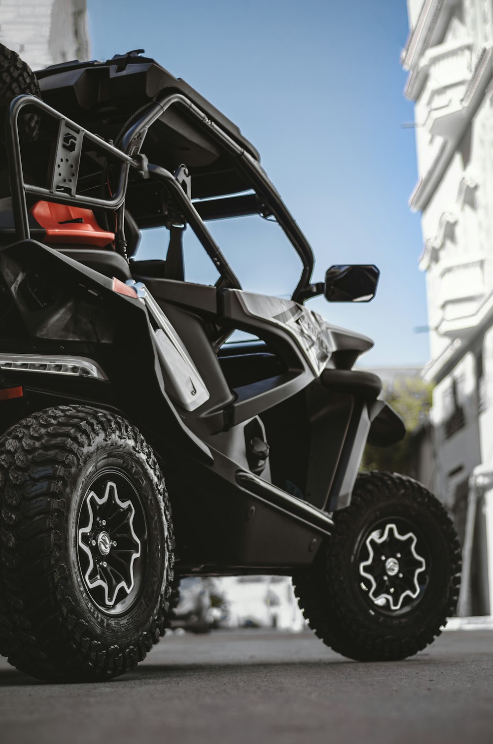 a can - am spyder parked on the side of the road