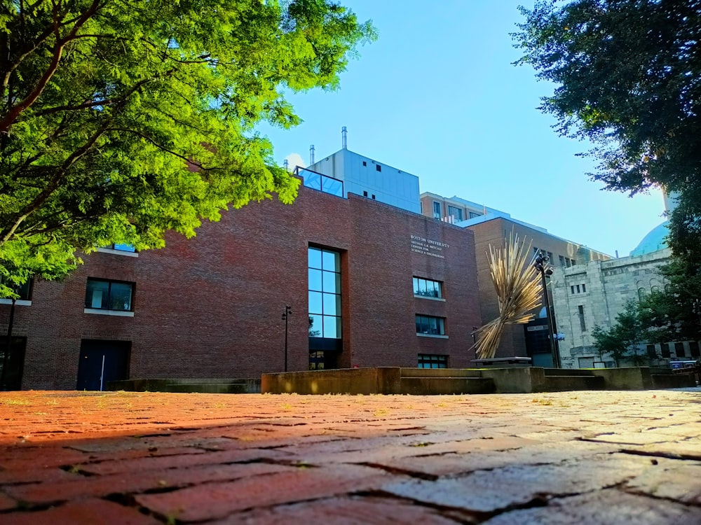 a brick building with a clock tower on top of it