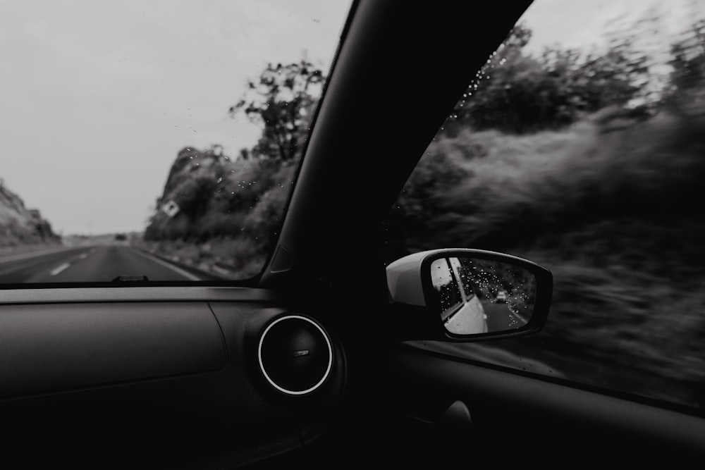 a view of a road from a car window