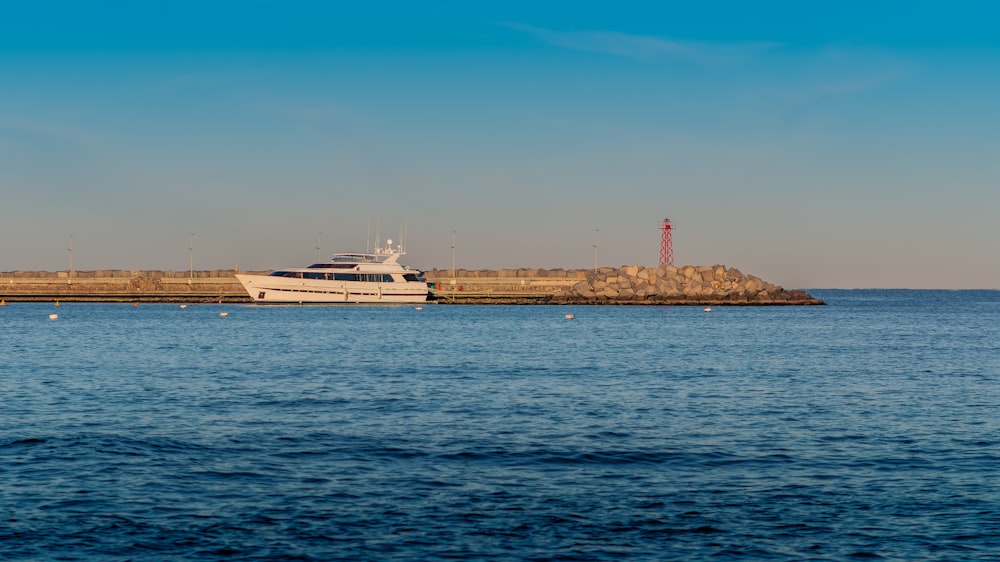 a large boat in the middle of a body of water