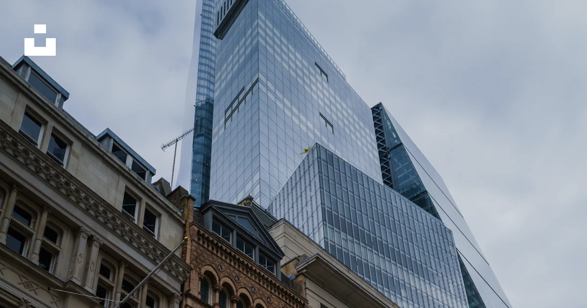 Next One Building A group of buildings that are next to each other photo – Free Building ...