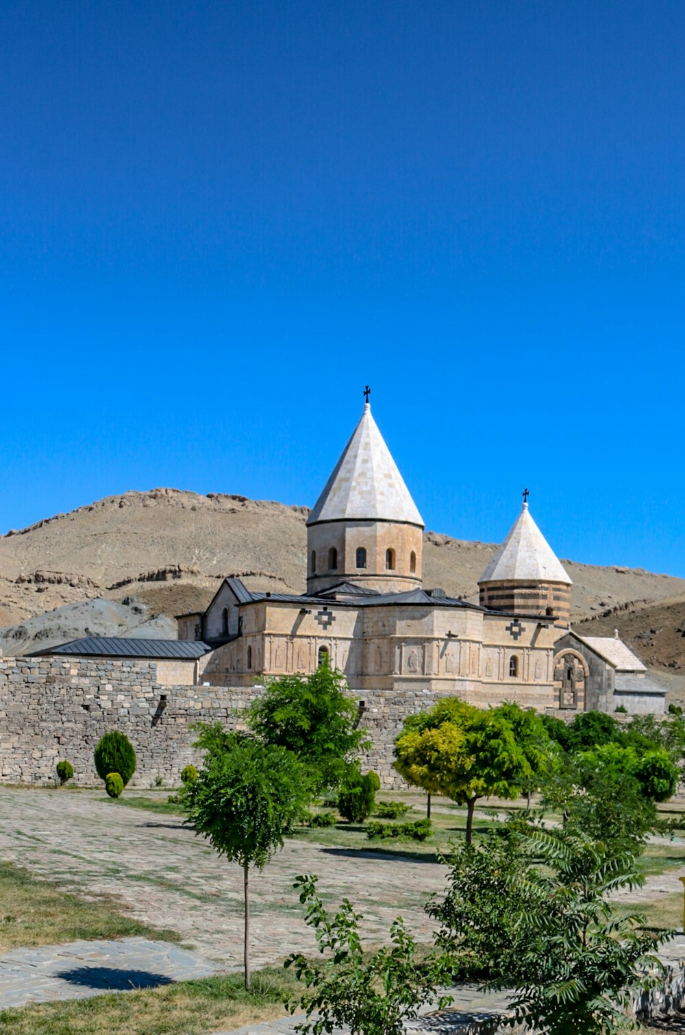 a large building with two towers on top of it