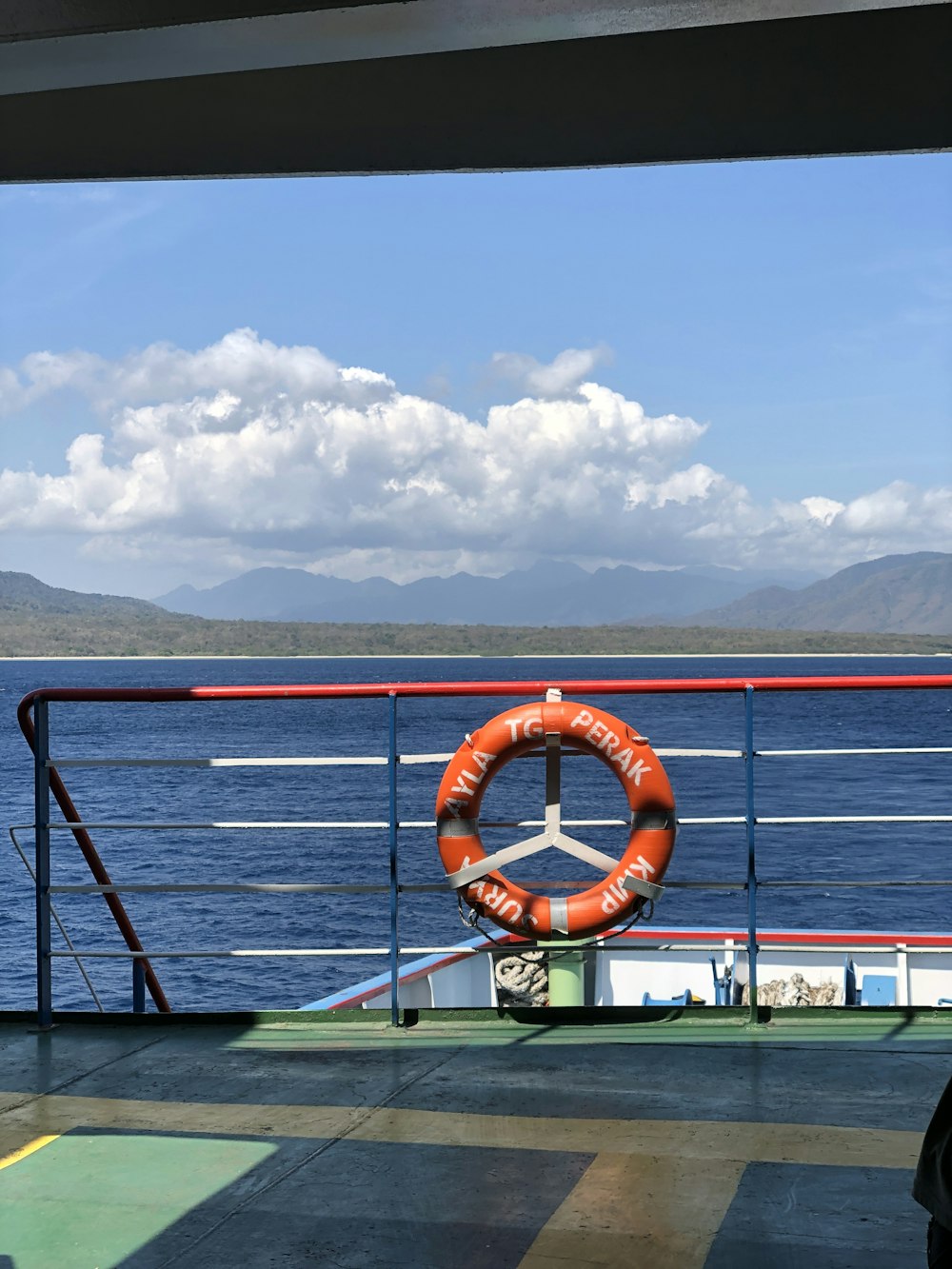 a life preserver on the deck of a cruise ship